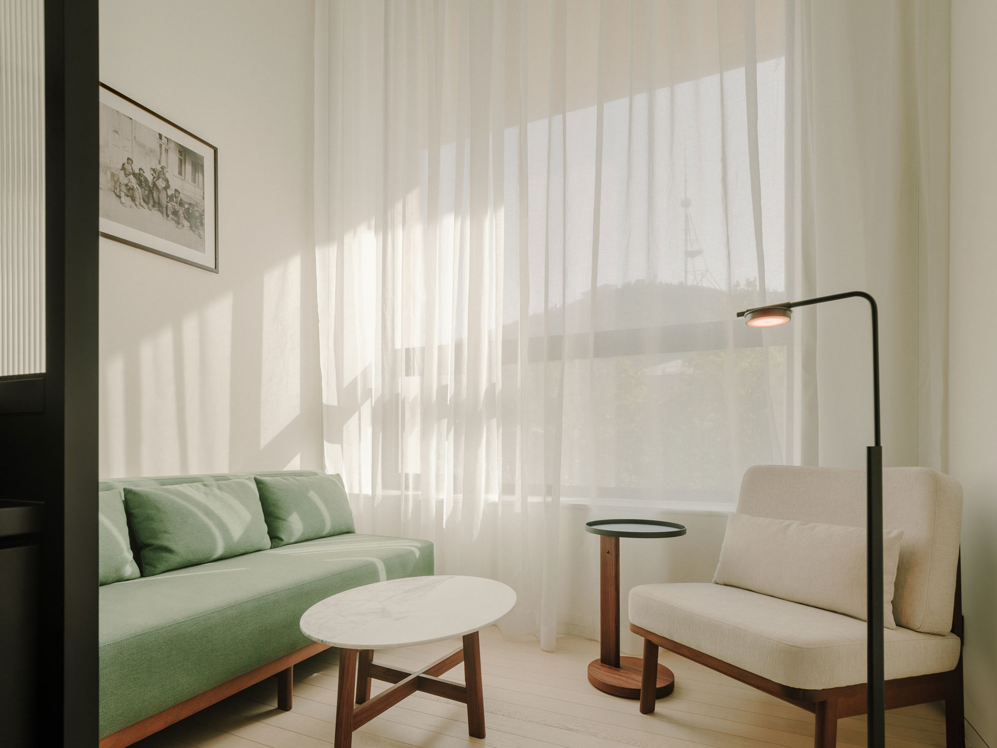 Classic Twin Room at The Telegraph Hotel Tbilisi with two separate premium beds.